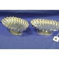 Pair of ornate silverplated dishes of oval form with pierced scalloped