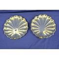 Pair of circular shaped sixteen section scalloped silver plated dishes on raised
