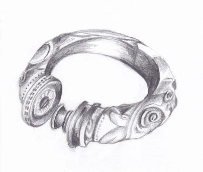 Broighter Collar-A Closer Look Curvilinear design on the convex of the collar Raised decoration with concentric arcs of circles incised with a compass
