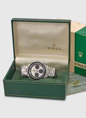 - The auction - lot 199. lot 184. ROLEX A very rare and extremely attractive stainless-steel chronograph wristwatch with bracelet, period box and booklet.