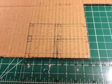 5cm from the outside. Cut out the 3 cm x 5 cm rectangles.