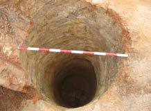 Excavation in this sand fill continued within the shaft to a depth of 5m below the existing surface level (Fig. 19).
