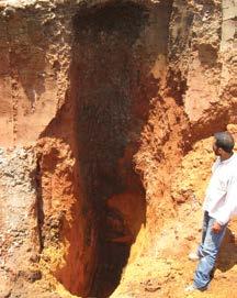The black clayey soil accumulated at the bottom of the shaft, and over time the black clayey sediment became fixed in the shaft s form.