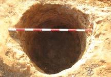 It should be noted that we did not reach the bottom of the shaft; the excavation had to be discontinued because we had reached the mechanical excavator s dig limitations.