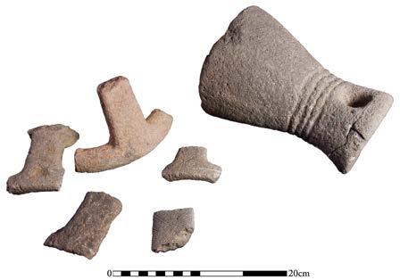 THE GROUND STONE ASSEMBLAGE Figure 89. Fragments of ground stone bowls on fenestrated stands. Figure 90. Complete ground stone bowl on a fenestrated stand. Figure 91.