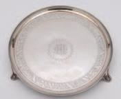 103 103 A George III small silver salver, maker Henry Chawner, London, 1791, of circular form, reeded rim on swept feet, the