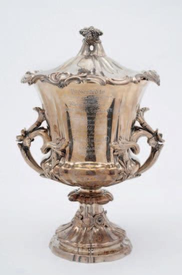 500-600 59 A George III silver teapot, maker CH, London, 1792 of oval outline, with oval cartouches enclosed by garlands with foliate borders, 14.51ozs.