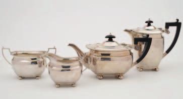 200-300 12 A George V silver four piece tea set, maker Elkington & Co Ltd, Birmingham 1914, the hot water jug Birmingham 1913, all