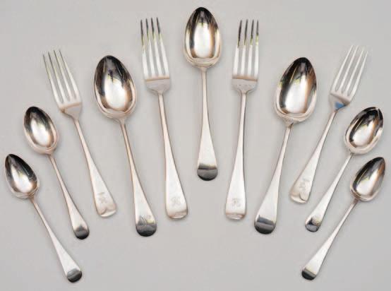 34 An extensive matched Old English pattern silver flatware service, various makers and dates, includes nine tablespoons, twenty four dessert spoons, thirteen egg spoons,.