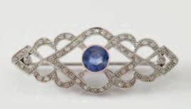 1500-2000 150 149A A sapphire, emerald and diamond cluster brooch: designed as an informal cluster of