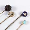 Lot: 108 Lot: 113 Various antique stickpins, comprising half pearl set horseshoe, oval turquoise set in plain gold frame, both tested 9ct, a ball style head set