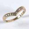 00 Lot: 6 Ladies' half wishbone ring, with eleven small diamonds in channel settings, total weight 0.17 carats, 9ct gold h/m, size L or 5.3/4 US (1.9g) Estimate: 50.00-80.