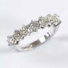 (3.7g) (2) Lot: 32 Ladies' CZ set ring, comprising large round cut stone in four long claw setting, seven baguette cut