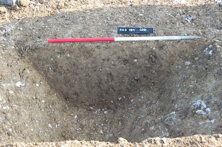 Plate 10. Ditch 0291 (part of GN 0540), facing south (1m scale) Pit 0487 was 4.6m wide and 5.4m long, with a round-cornered rectangular shape in plan.