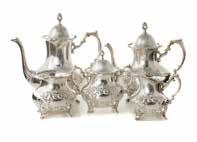ozt Est $700-900 408 Poole Repousse Sterling 5-pc Coffee & Tea Service In the Crest of Windsor pattern, model 980, hand chased, comprising: coffee pot (10 1/2 in H), teapot, covered sugar bowl, cream