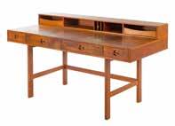 Modern Teakwood Desk mid-20th century; stamped Denmark with HP Hansen Mobelindustri sticker, floating cabinets attached to round turned and tapered legs, left hand compartment with three short