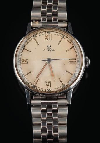 A gentleman s mid 20th century stainless steel Omega wristwatch the matt cream dial with baton markers and Roman numerals with centre seconds hand and
