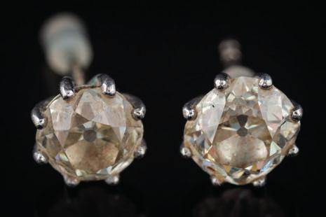 * 250-300 225 A matched pair of diamond singlestone ear studs each with a round old brilliant-cut diamond approximately 0.7ct and 1.
