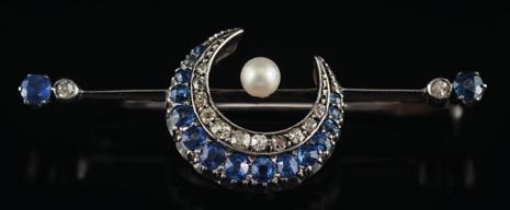 230 A late 19th century gold, sapphire, pearl and diamond crescent bar brooch with a crescent of