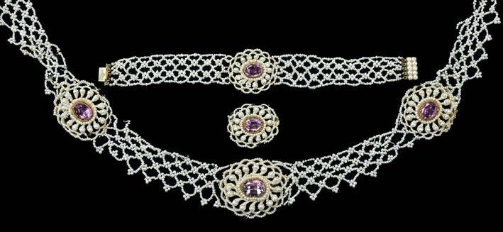 600-800 128 A WOVEN SEED PEARL AND AMETHYST SUITE, FIRST HALF OF 19TH CENTURY, comprising a necklace, bracelet and brooch, the necklace with three oval openwork cluster panels, each centred with a