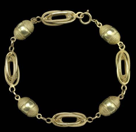 177 AN 18CT GOLD BRACELET, composed of acorn-shaped links with double caps, between openwork textured and polished links, ring and bolt clasp stamped 750, length 22cm,