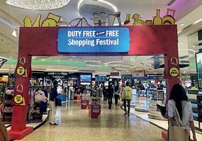 INTERNATIONAL SHOPPING GUIDE Mumbai Duty Free. Below: The festival is hard to miss with flashy banners put up.