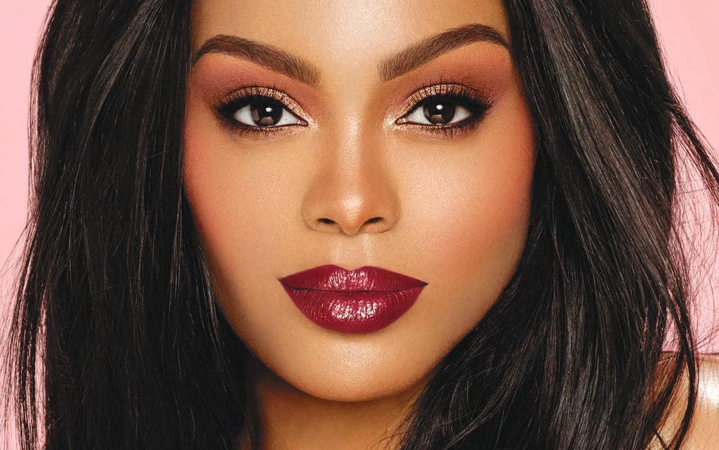MALIKAH IS WEARING AMORE SHINE IN DESIRE AMORE SHINE LIQUID LIP COLOR MALS Combines the color intensity of our