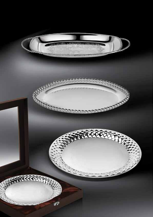 Breathtaking in silver Spectacular trays in silver that feature dainty and ornate carvings for an opulent aura.